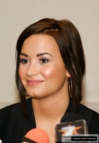 Disney's Lovato quits tour, enters treatment