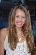 Miley Cyrus : TI4U_u1160231909.jpg
