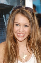 Miley Cyrus : TI4U_u1160231935.jpg