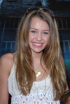 Miley Cyrus : TI4U_u1160232205.jpg