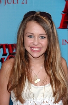 Miley Cyrus : TI4U_u1160232240.jpg
