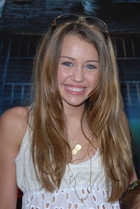 Miley Cyrus : TI4U_u1160232261.jpg