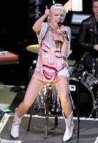 Miley Cyrus : miley-cyrus-1394130255.jpg