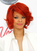 Rihanna teases new album, climbs iTunes chart