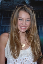 Miley Cyrus : TI4U_u1160232261.jpg