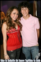 Miley Cyrus : TI4U_u1175825893.jpg