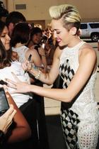 Miley Cyrus : miley-cyrus-1369064651.jpg