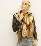 Miley Cyrus : miley-cyrus-1396791668.jpg