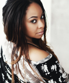 Raven-Symoné : raven-symon-1364924479.jpg